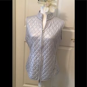 Silver Greg Norman Ladies golf vest.   So cute !